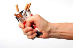 Isolated-shot-of-broken-cigarettes-on-white-background[1]