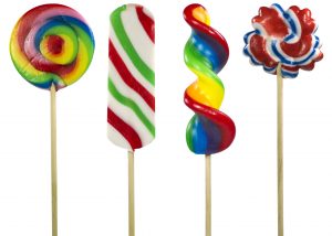 Four sweet and colorful Lollipos. Isolated on white with clipping path for each object.