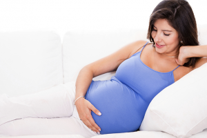 pregnant-woman-on-couch[1]